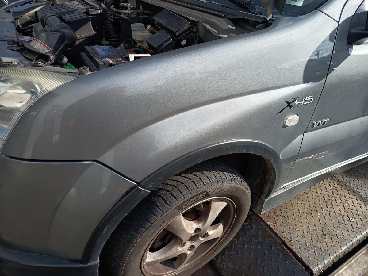 Suzuki Ignis MH original Kotfl&uuml;gel links C12 Midnight Grey Bj 2006
