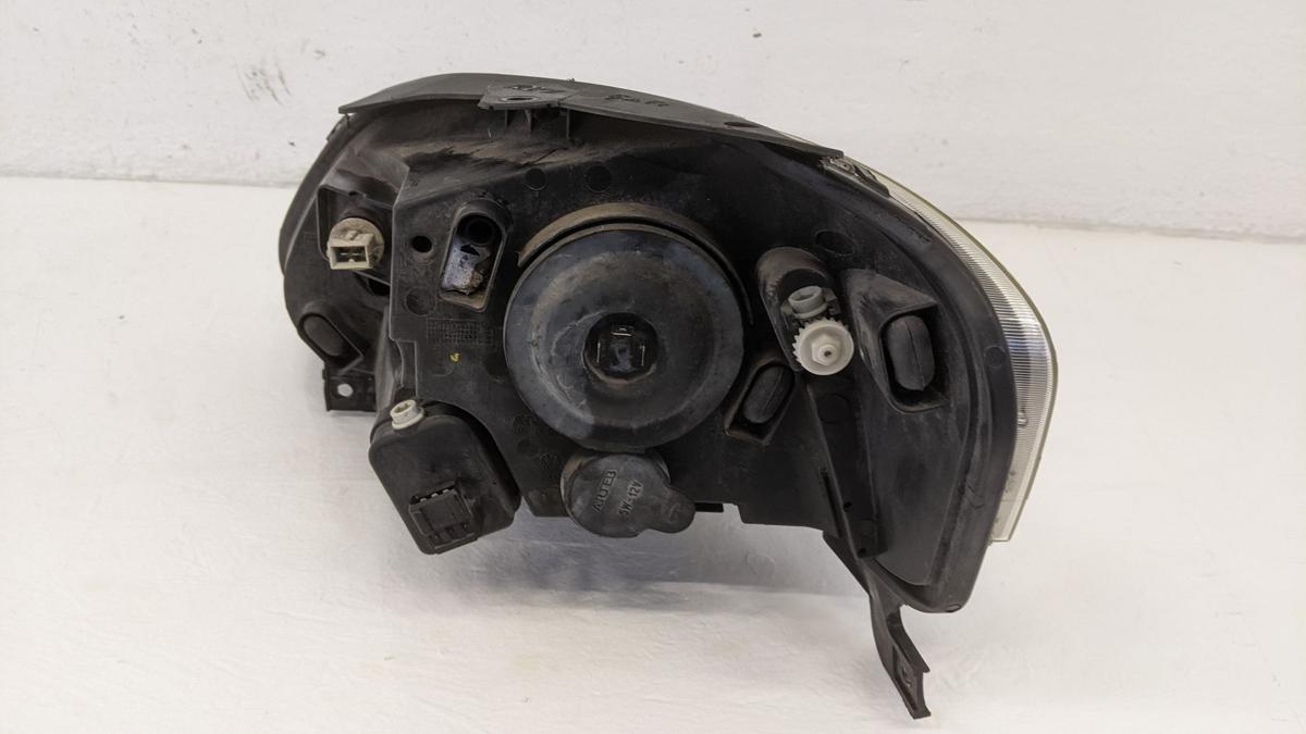 Scheinwerfer Lampe Hauptscheinwerfer rechts Arteb VW Fox 5Z Text lesen