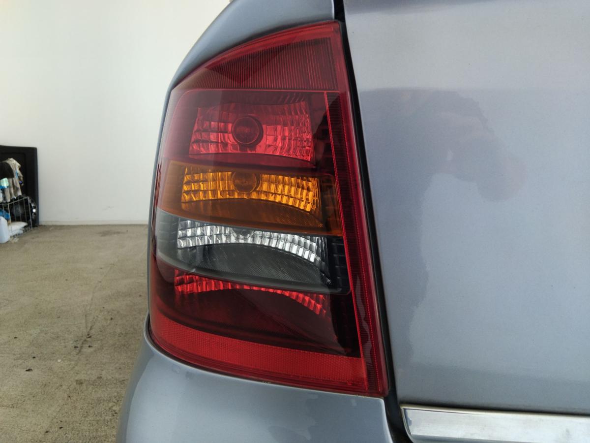 Opel Astra G Cabrio Coupe original Rückleuchte Heckleuchte links BJ2004 dunkel