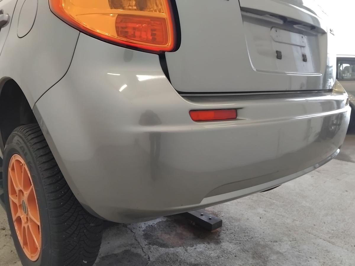 Suzuki SX4 original Sto&szlig;f&auml;nger Sto&szlig;stange hinten 5t&uuml;rig BJ2006 ZCD Galactic Gray