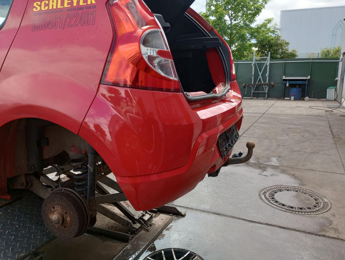 Dacia Sandero I orig Stoßstange Stossfänger hinten 21D Feuerrot Bj 2009