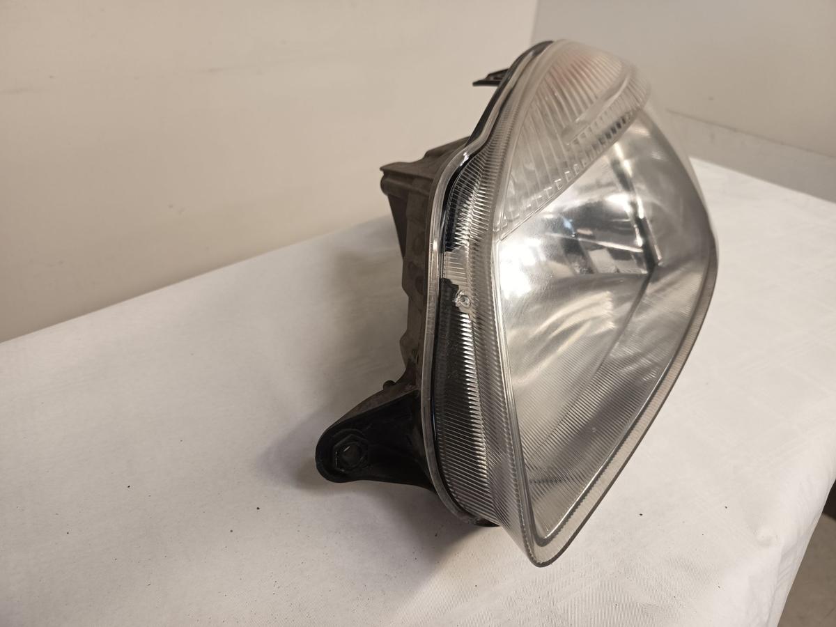 Skoda Fabia II 5J orig Scheinwerfer links Halogen/Haupt/Licht/Front Bj 2009