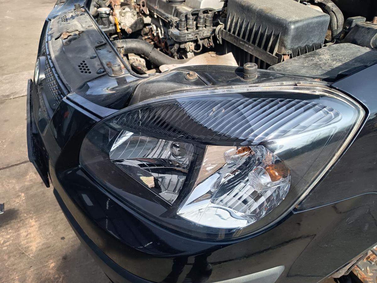 Kia Rio II original Scheinwerfer links Halogen Haupt Licht Front Bj 2009