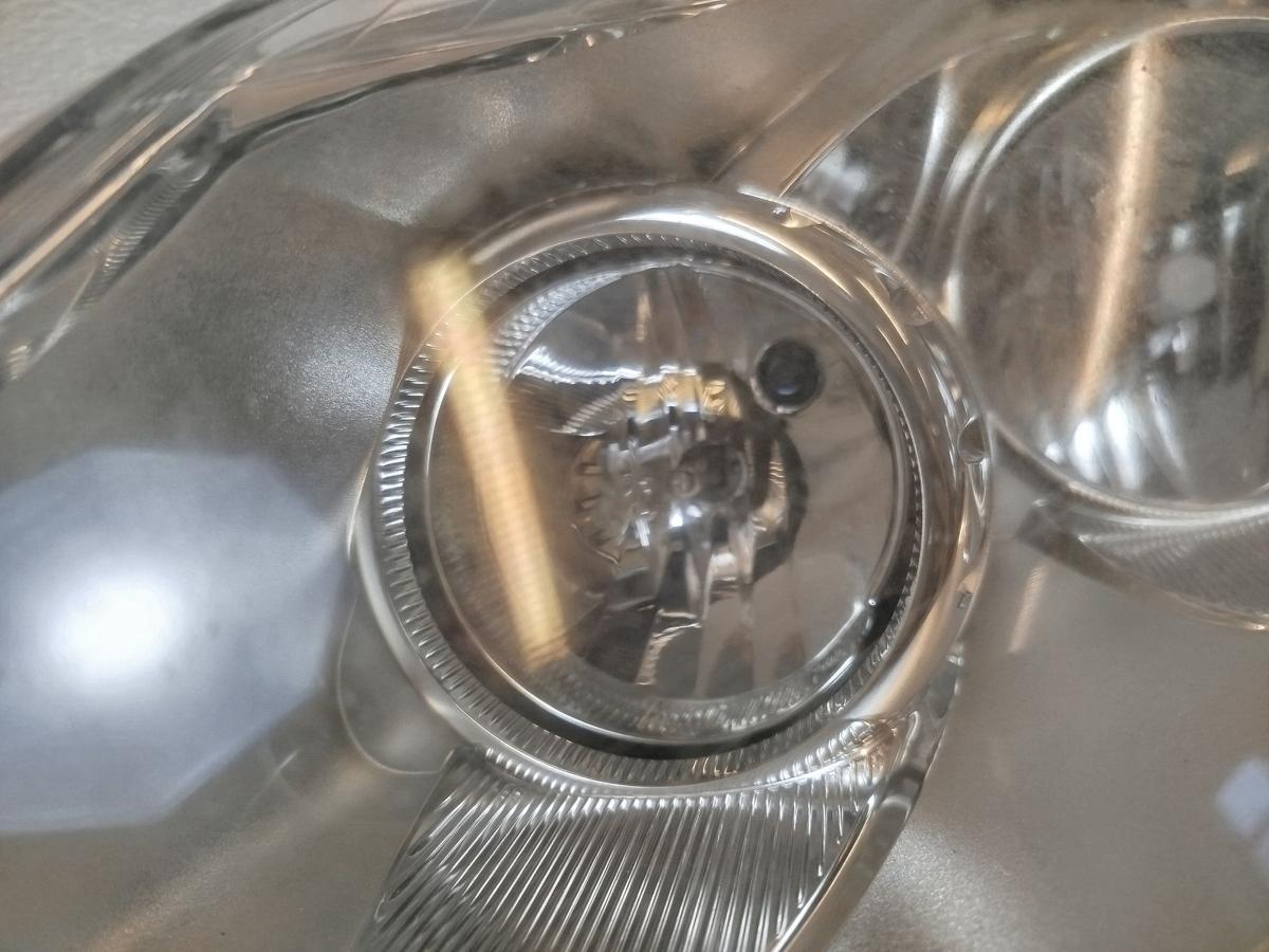 Opel Corsa D Scheinwerfer links Frontscheinwerfer Halogen Lampe OEM tr&uuml;b