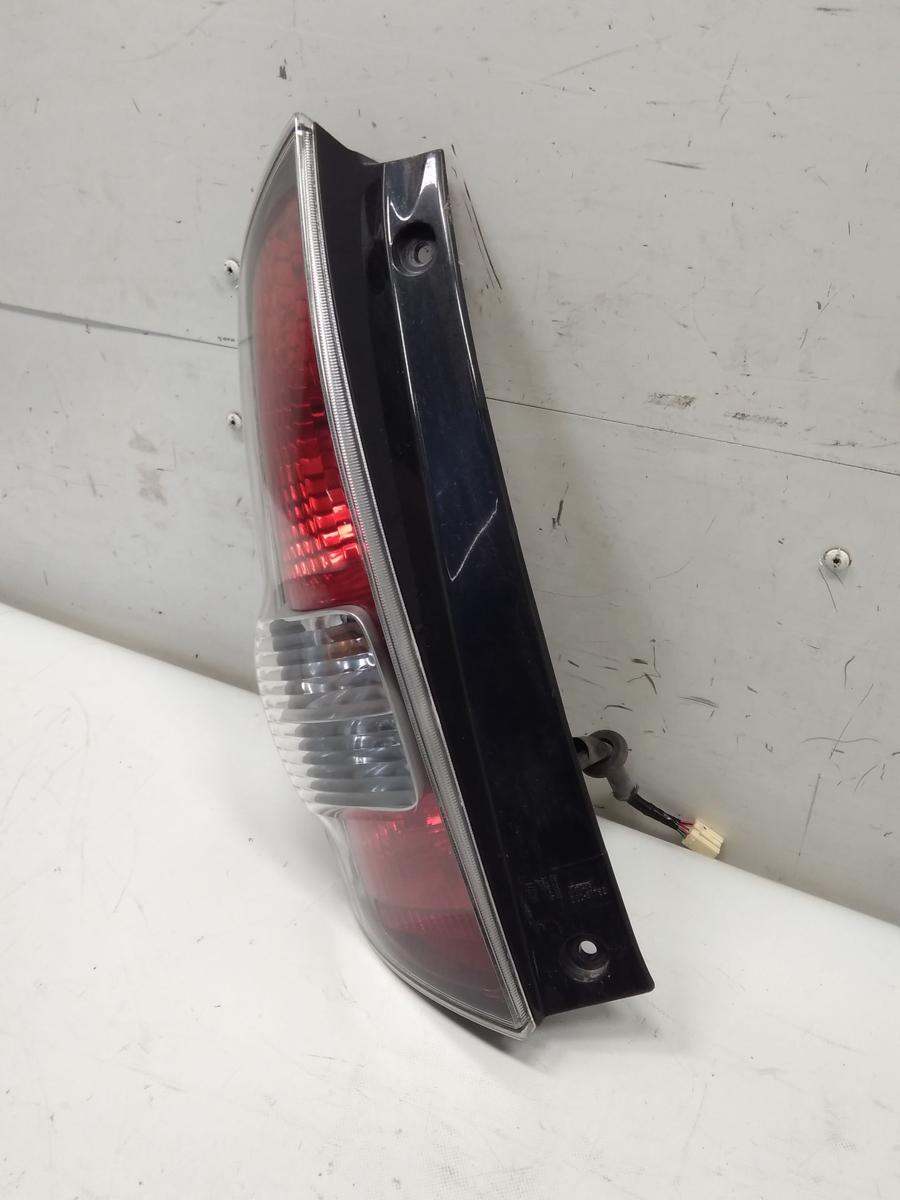 Daihatsu Sirion 2 M300 original Rückleuchte Heckleuchte links BJ2008