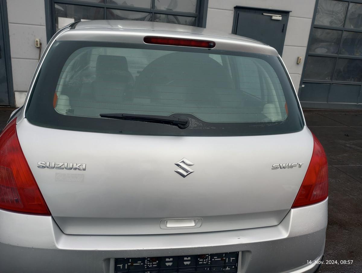 Suzuki Swift MZ EZ orig Heckklappe mit Scheibe Kofferraum ZCC Silber Bj 2005