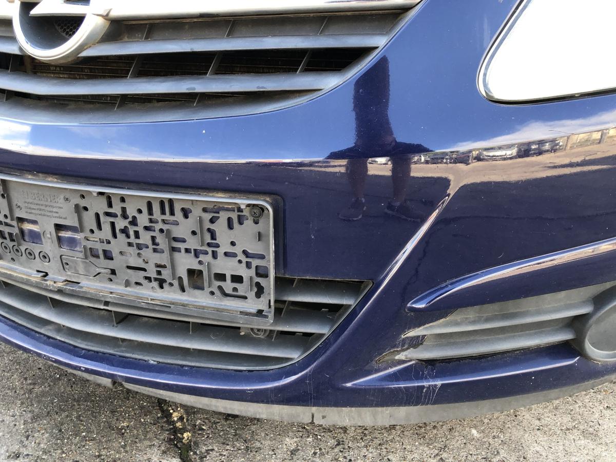 Opel Corsa D Stoßfänger vorn Frontstoßstange mit Grill Z20Z Royalblau Schaden