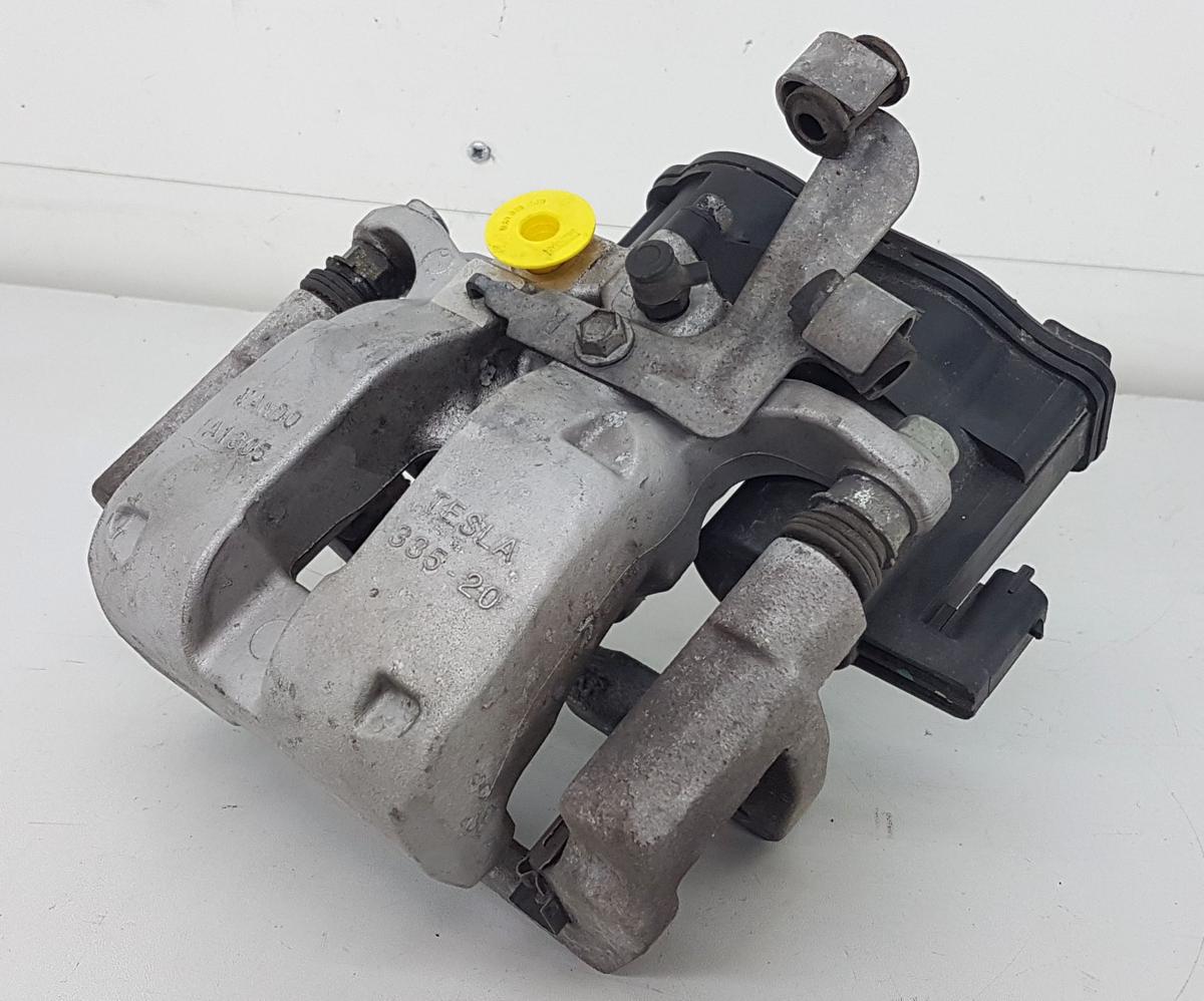 Tesla Model Y Bremssattel hinten links Bj2022 1044628-00-A inkl Tr&auml;ger