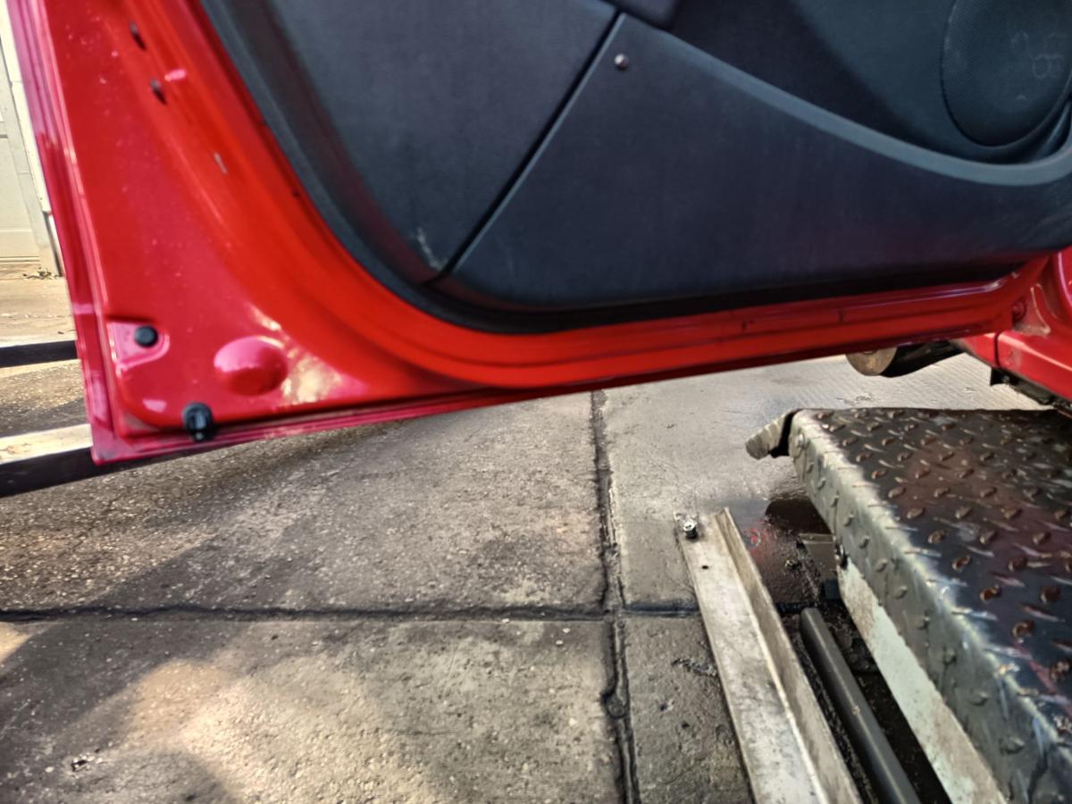 Dacia Sandero 1 BS original Tür vorn links Fahrer OV21D Red Passion Bj 2009