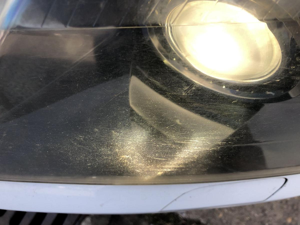 Opel Astra H GTC Scheinwerfer links Xenonscheinwerfer Tr&uuml;b OEM Hella Lampe