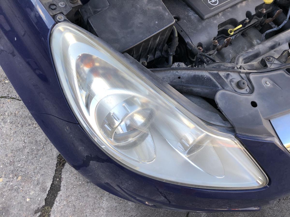 Opel Corsa D Scheinwerfer rechts Frontscheinwerfer Halogen OEM Trüb bis 2010