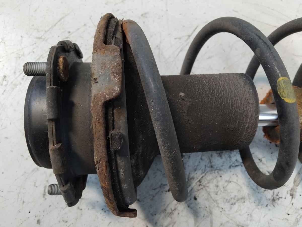 Toyota Avensis T22 orig Federbein Sto&szlig;d&auml;mpfer vorn links 1.8 95kw 1ZZ BJ2002