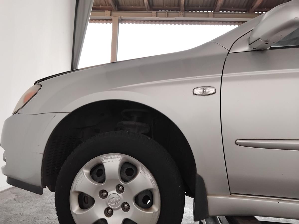 Kia Cerato FE orig Kotfl&uuml;gel vorn links 6C clear silver BJ2008 mit Blinkerloch
