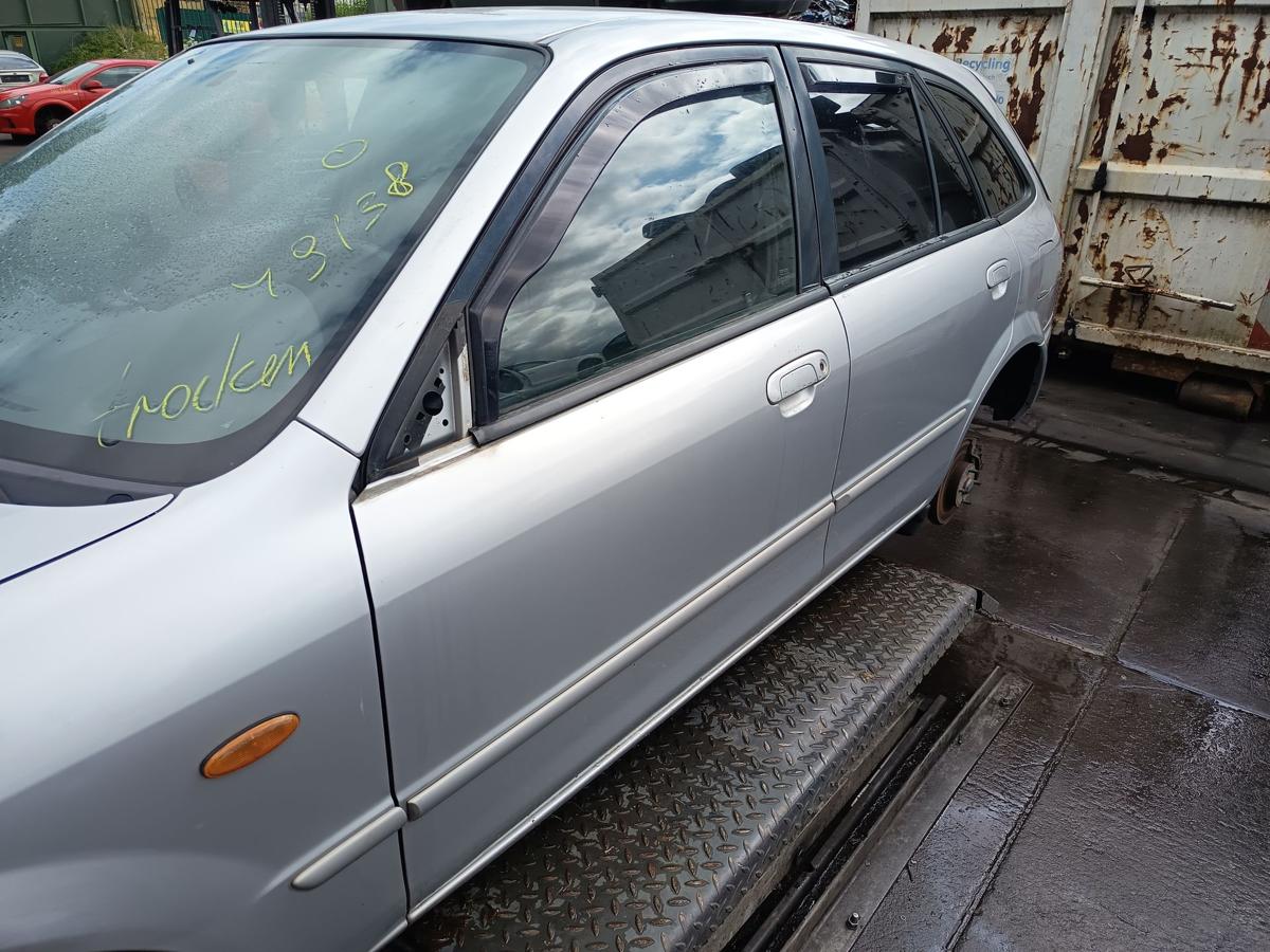 Mazda 323f VI original Tür vorn links Fahrer 22V Satinsilber Bj 2002