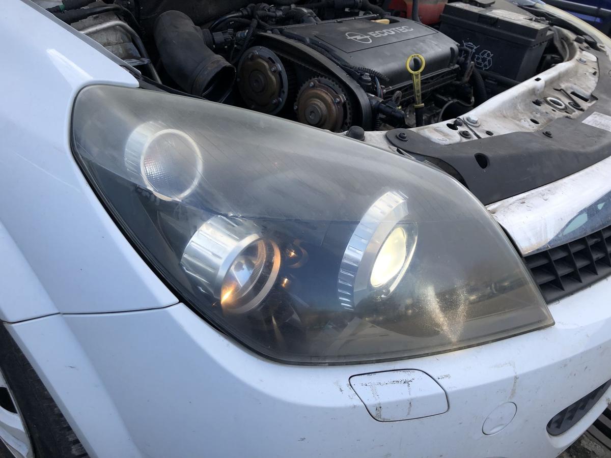Opel Astra H GTC Scheinwerfer rechts Xenonscheinwerfer Tr&uuml;b OEM Hella Lampe