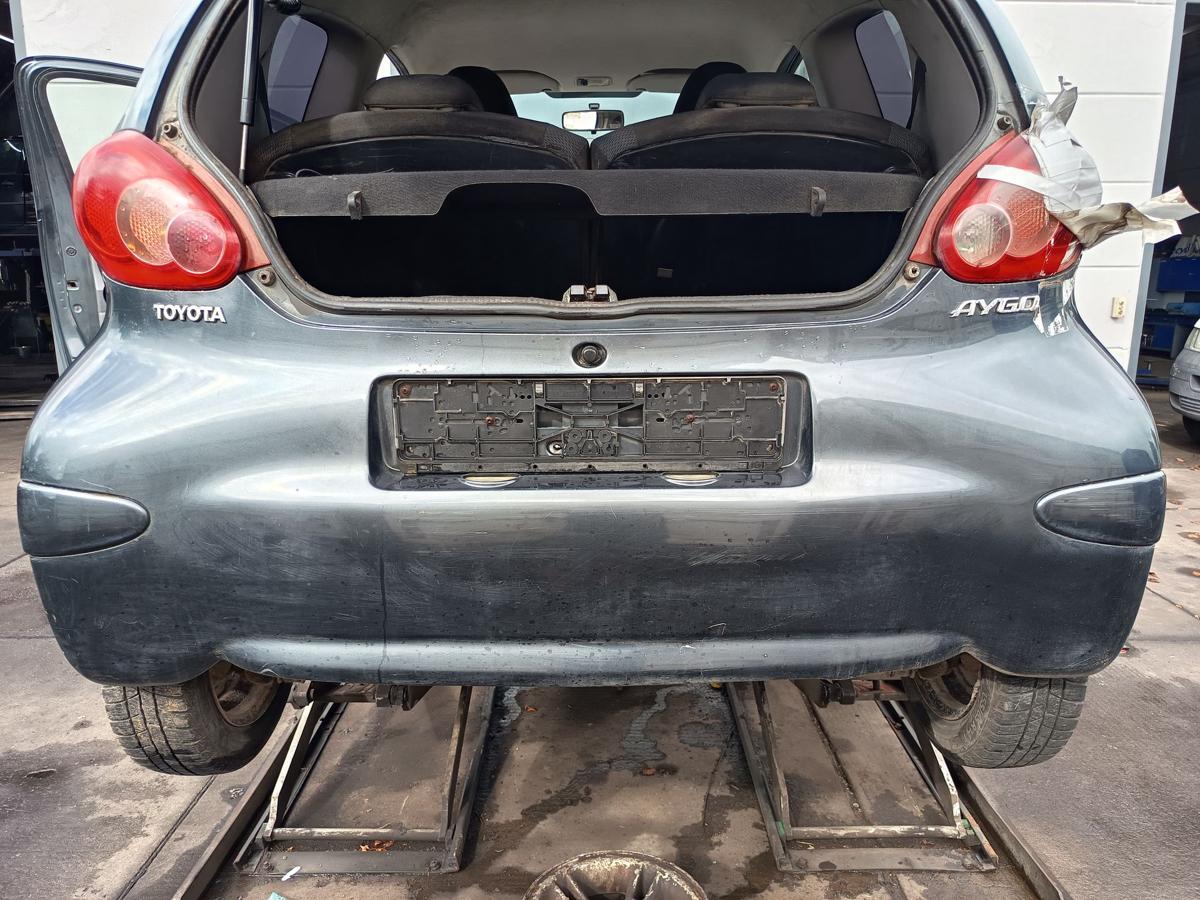 Toyota Aygo I original Sto&szlig;stange F&auml;nger hinten Heck 1E0 Rauchgrau Bj 2005