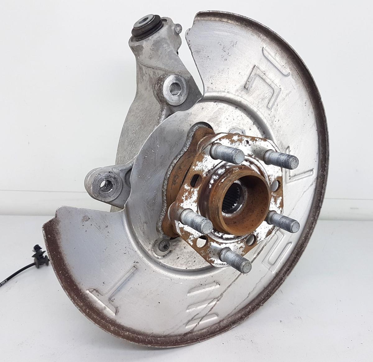 Tesla Model Y Achsschenkel hinten links Bj2022 1188411-00-F 335x20mm