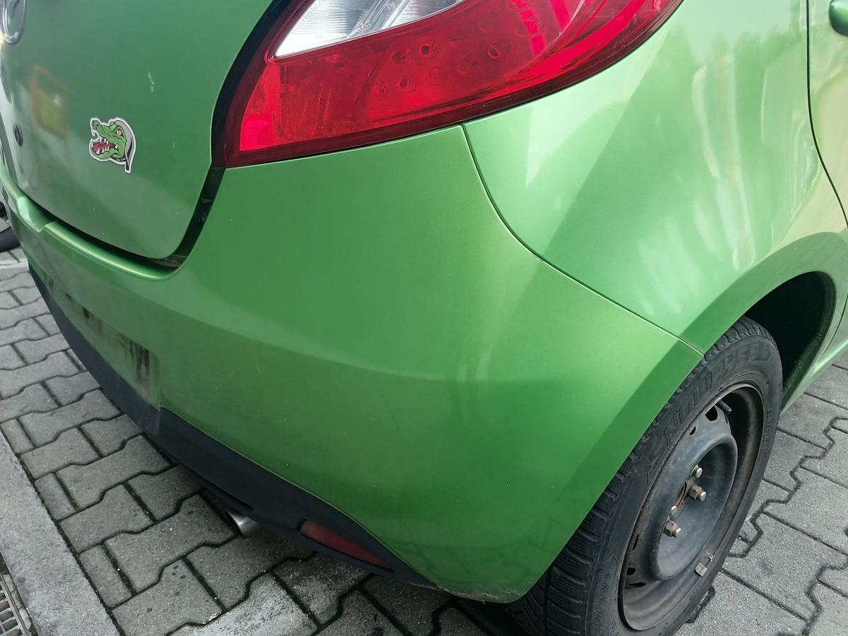 Mazda 2 DE original Stoßstange Stossfänger hinten Grünmetallic Bj.2009