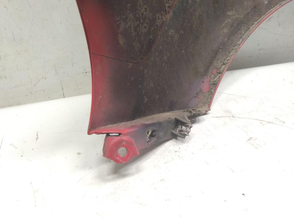 Renault Twingo 2 original Kotfl&uuml;gel vorn rechts rot uni BJ2012