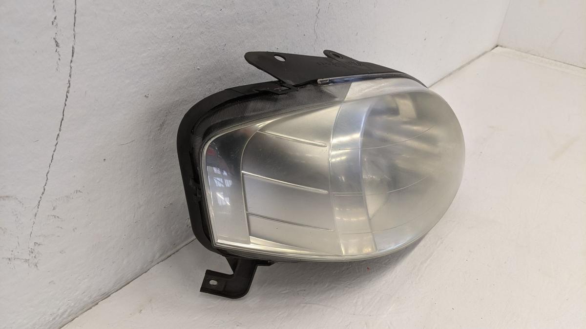 Scheinwerfer Lampe Hauptscheinwerfer rechts Arteb VW Fox 5Z Text lesen