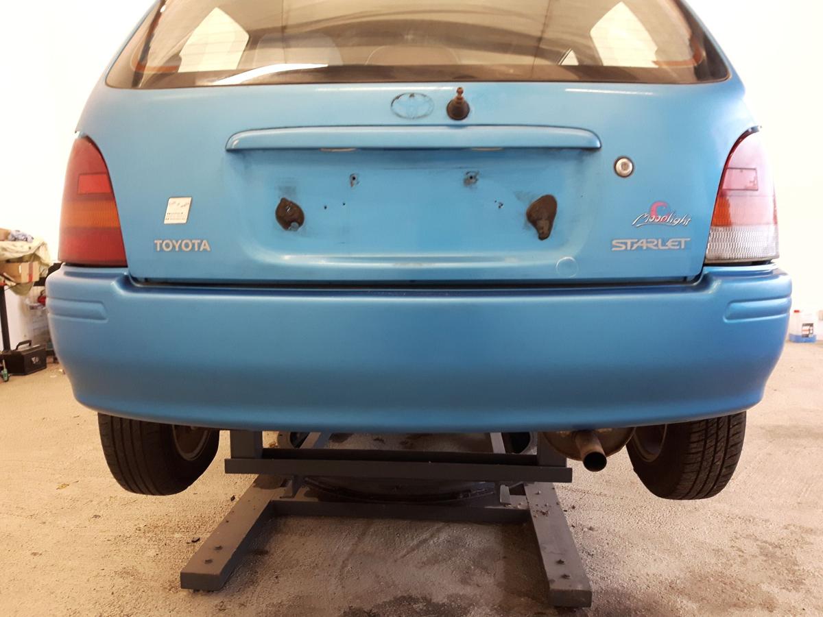 Toyota Starlet P9 original Stossfänger Stoßstange hinten Galaxy Blue Met. BJ97