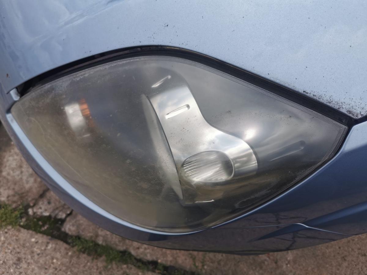 Ford Fiesta JD3 Scheinwerfer Hauptscheinwerfer Frontscheinwerfer vorn links trüb