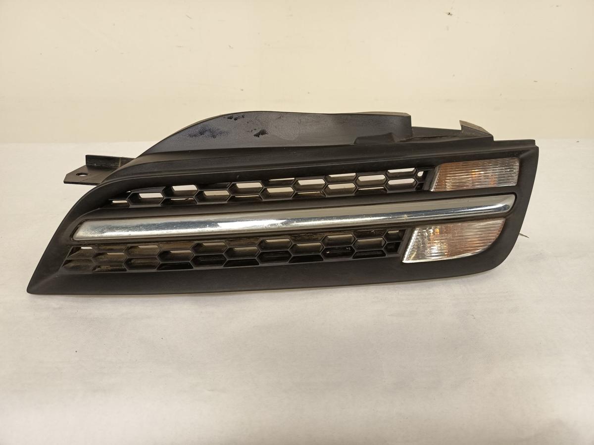 Nissan Micra K12 Cabrio orig Kühlergrillgitter mit Blinker vorn links Bj 2006
