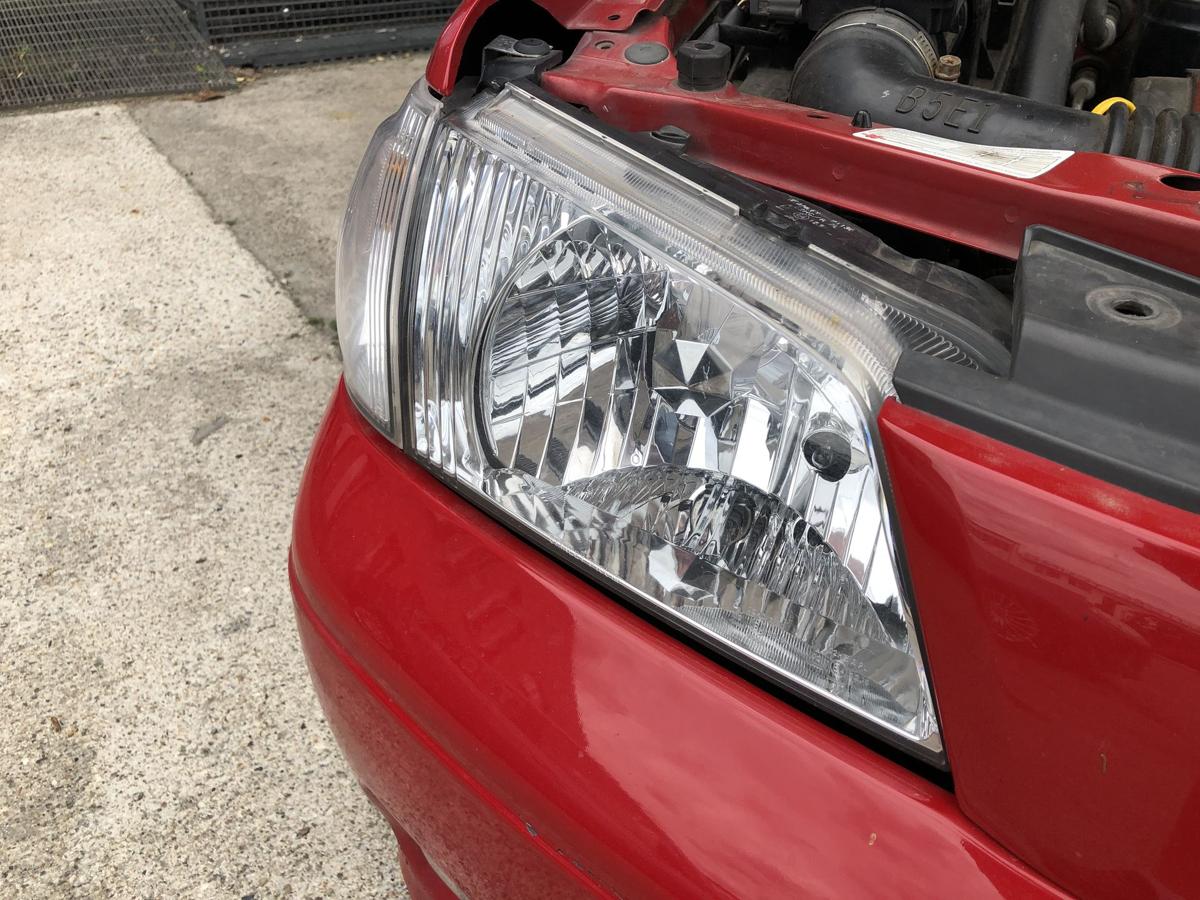 Mazda Demio DW Scheinwerfer rechts Hauptscheinwerfer Facelift Stanley ab 2000