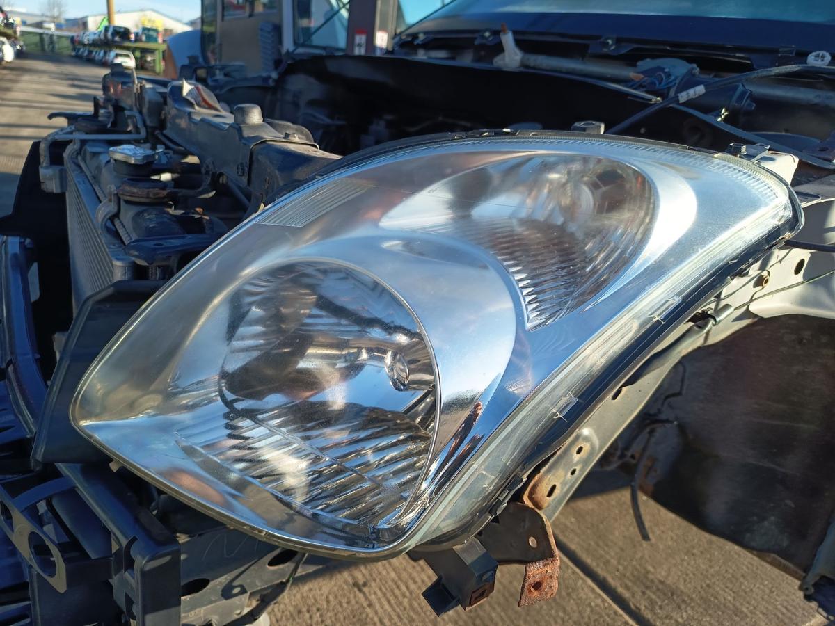 Suzuki Swift EZ original Scheinwerfer links Halogen Haupt Licht Front Bj 2006