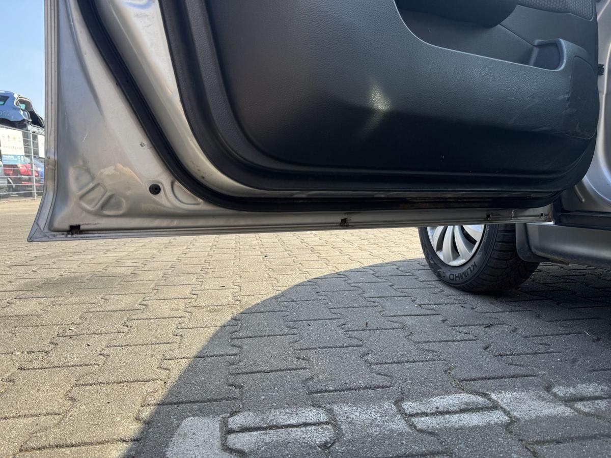 Nissan Tiida original T&uuml;r vorn links K23 Brilliant Silver Metallic Rohbau Bj.2009