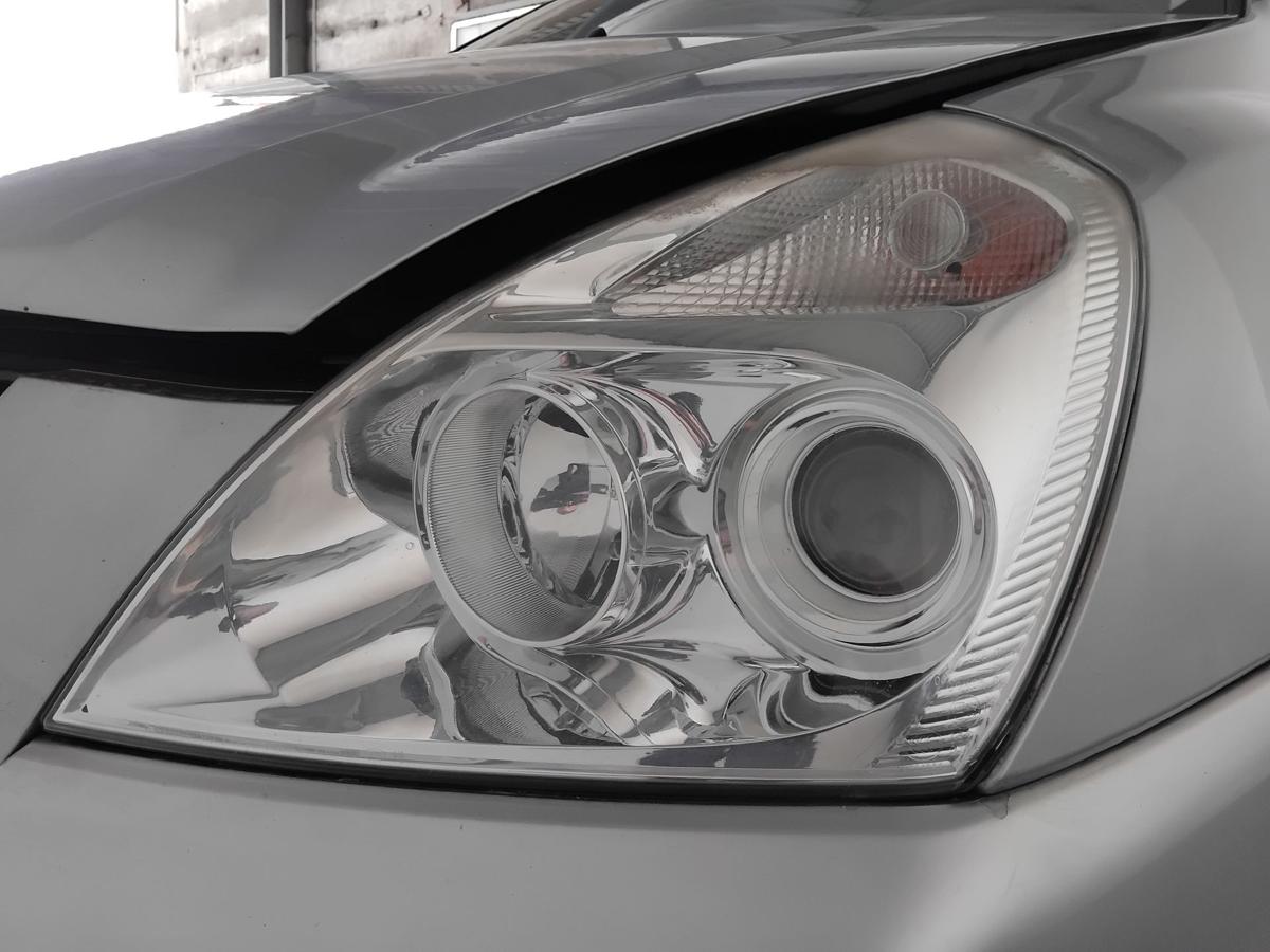Kia Carnival III MB original Scheinwerfer links Halogen mit LWR BJ2007