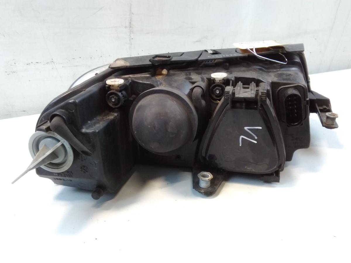 VW Passat 3BG Scheinwerfer links mit LWR Bj.2001
