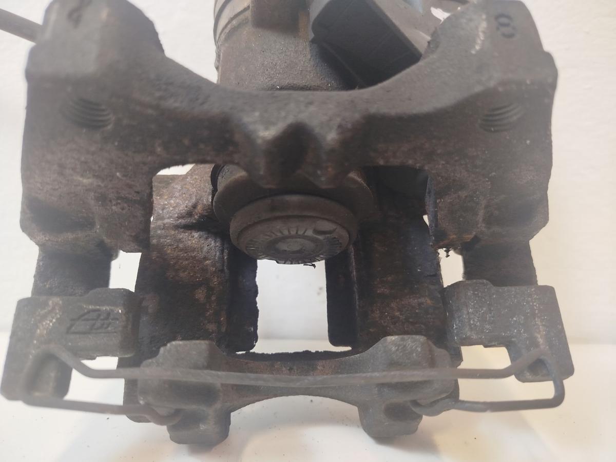 VW Golf Sportsvan AUV Bremssattel hinten rechts Bremszange elekt Parkbremse 272