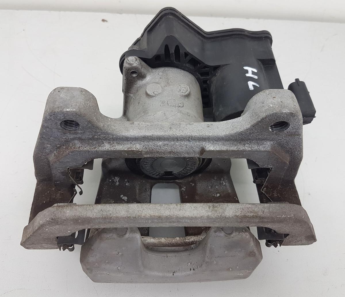 Tesla Model Y Bremssattel hinten links Bj2022 1044627-00-A inkl Tr&auml;ger