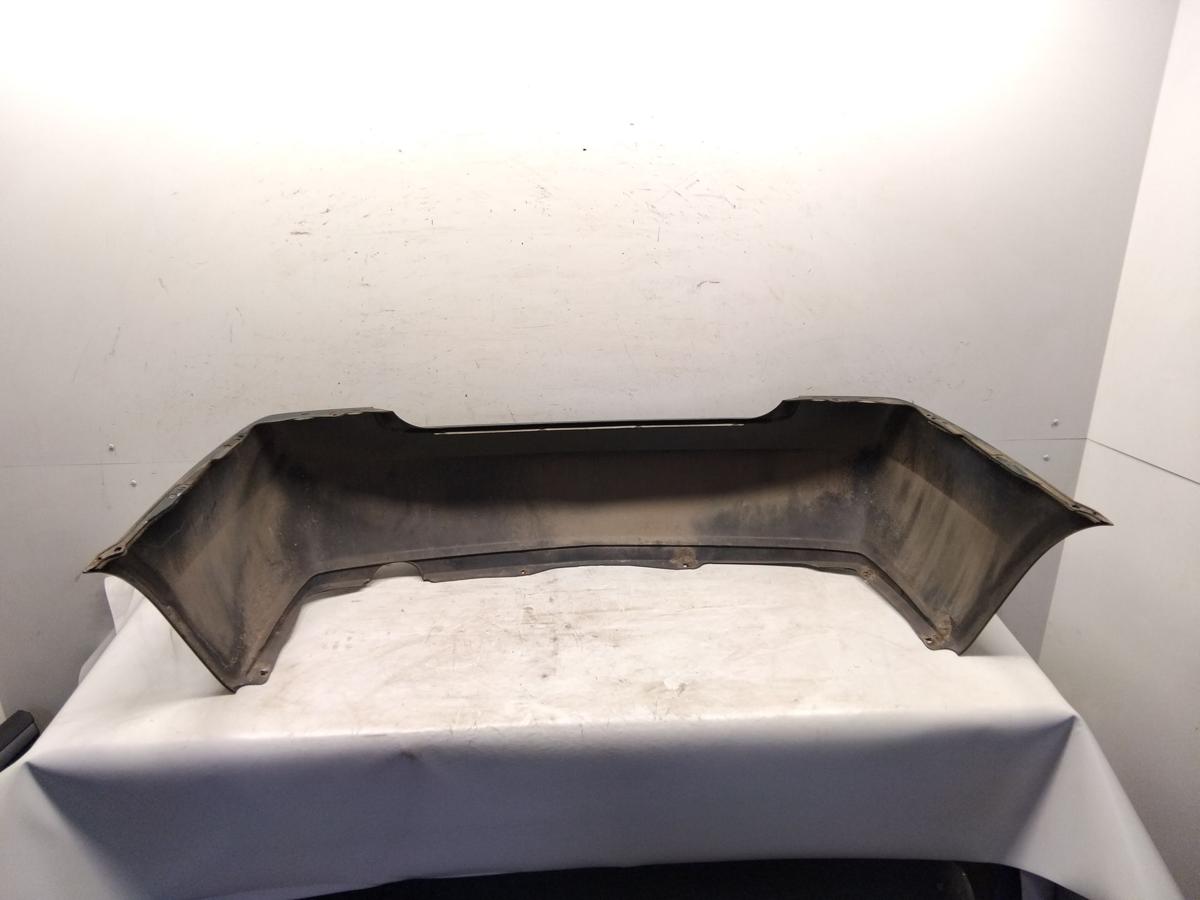 Nissan Primera P12 orig. Sto&szlig;f&auml;nger Sto&szlig;stange hinten Limousine BJ2002 DV9 Gr&uuml;nmetallic