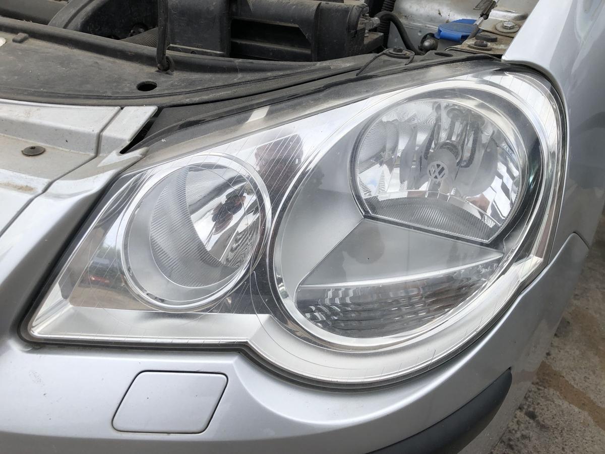 VW Polo 9N3 Scheinwerfer links Hauptscheinwerfer Halogen Hella OEM