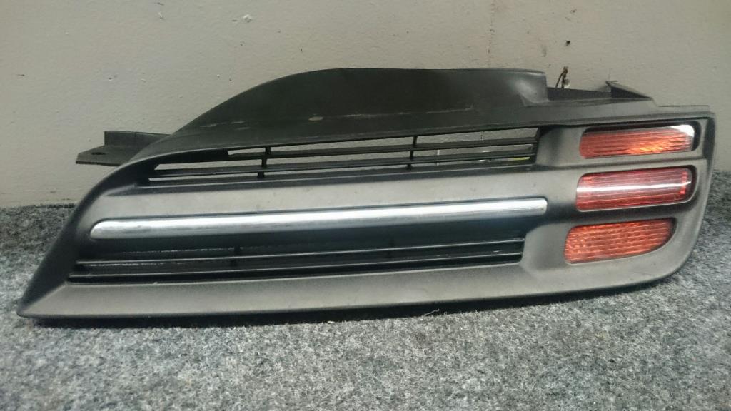 Nissan Micra K12 BJ 2003 Kühlergrill links Frontgrill Grill