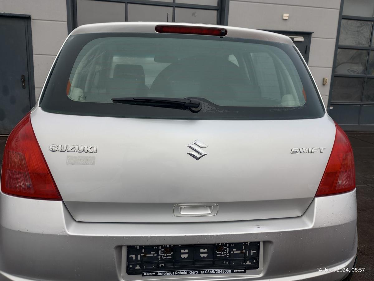 Suzuki Swift MZ EZ orig Heckklappe mit Scheibe Kofferraum ZCC Silber Bj 2005