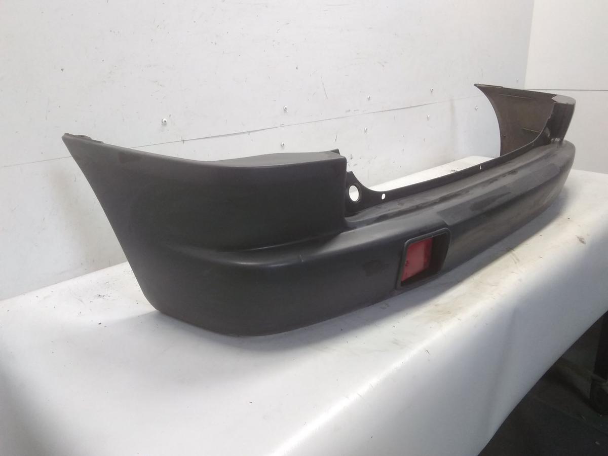 Mazda Demio original Stoßstange Stoßfänger hinten unlackiert BJ1998