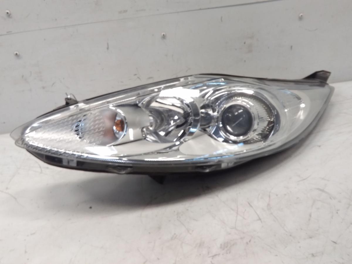 Ford Fiesta JA8 original Scheinwerfer links Hella Halogen mit LWR BJ2009
