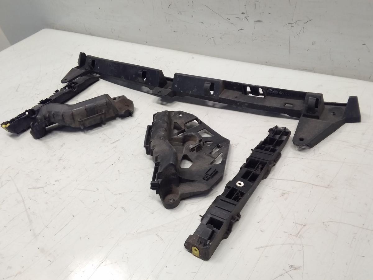 Opel Corsa E original Satz F&uuml;hrungen Halter Sto&szlig;f&auml;nger Sto&szlig;stange hinten Bj.2016