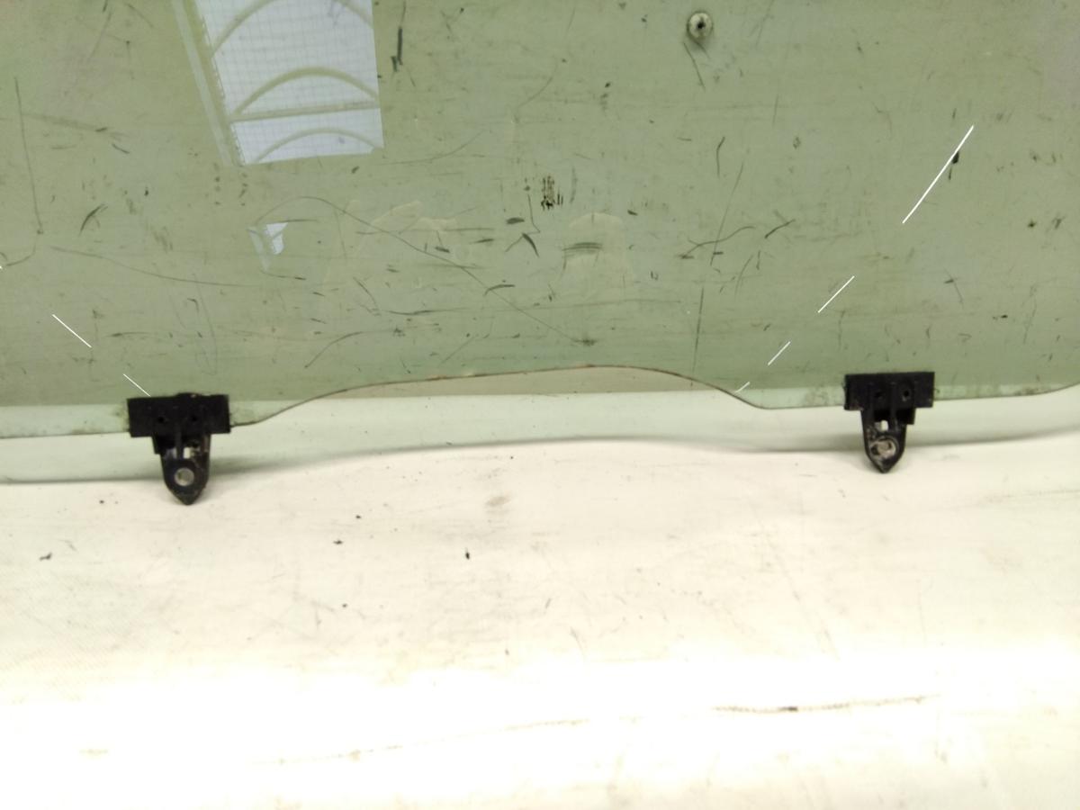 Nissan Primera P12 original T&uuml;rscheibe vorn links gr&uuml;ncolor BJ2002