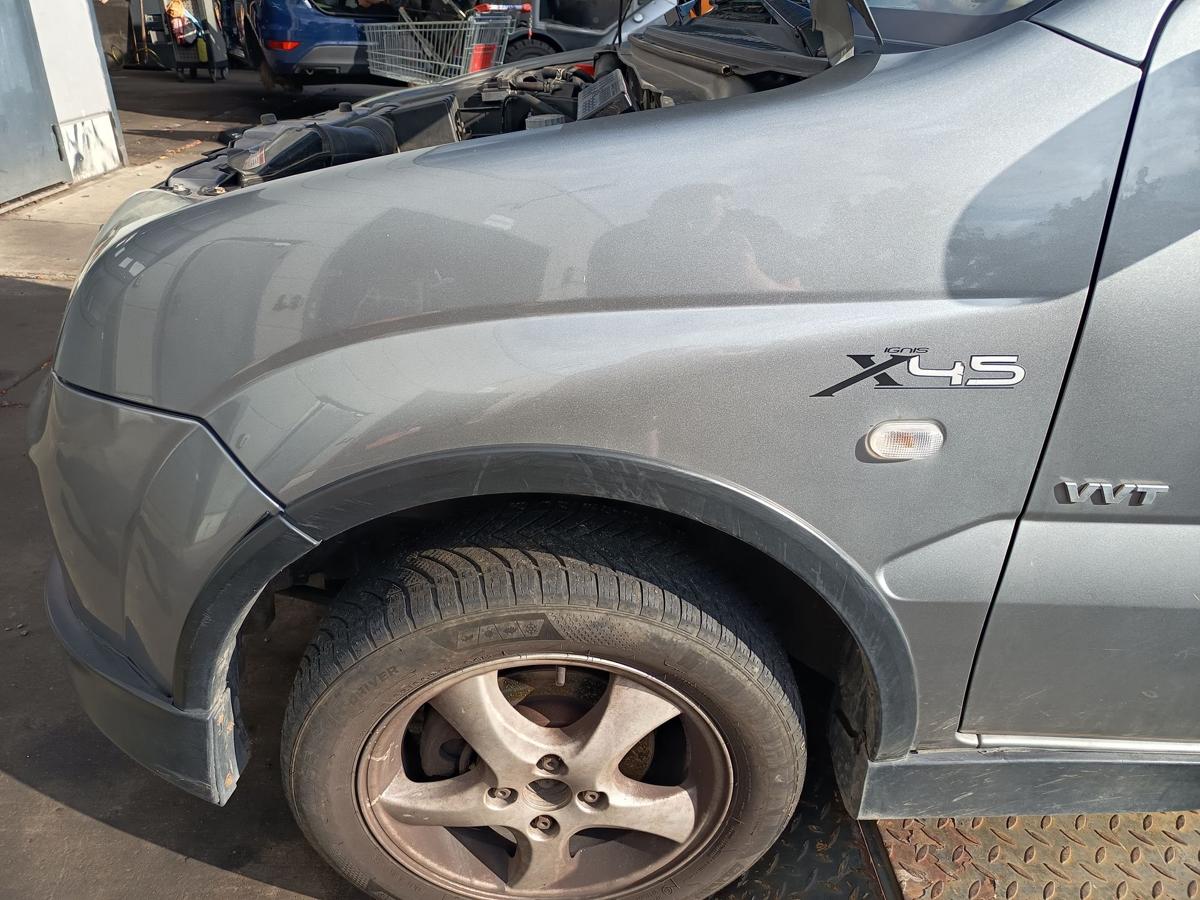 Suzuki Ignis MH original Kotfl&uuml;gel links C12 Midnight Grey Bj 2006