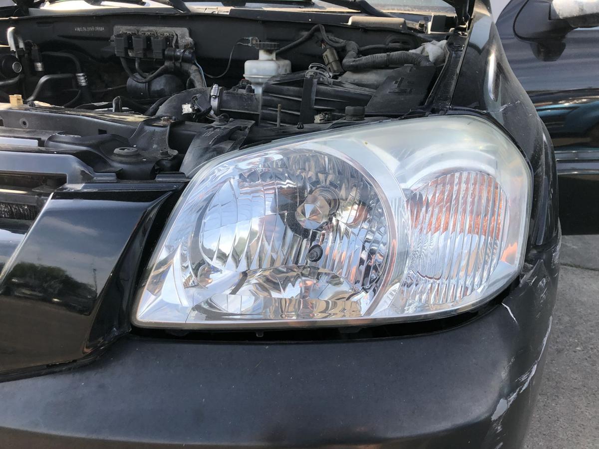 Mazda Tribute EP ab 2004 Scheinwerfer links Halogen Lampe EU Version Schaden!