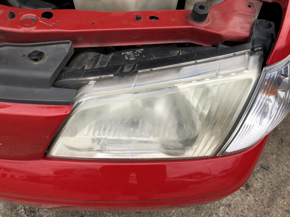 Mazda Demio DW Scheinwerfer links Hauptscheinwerfer Facelift Stanley ab 2000