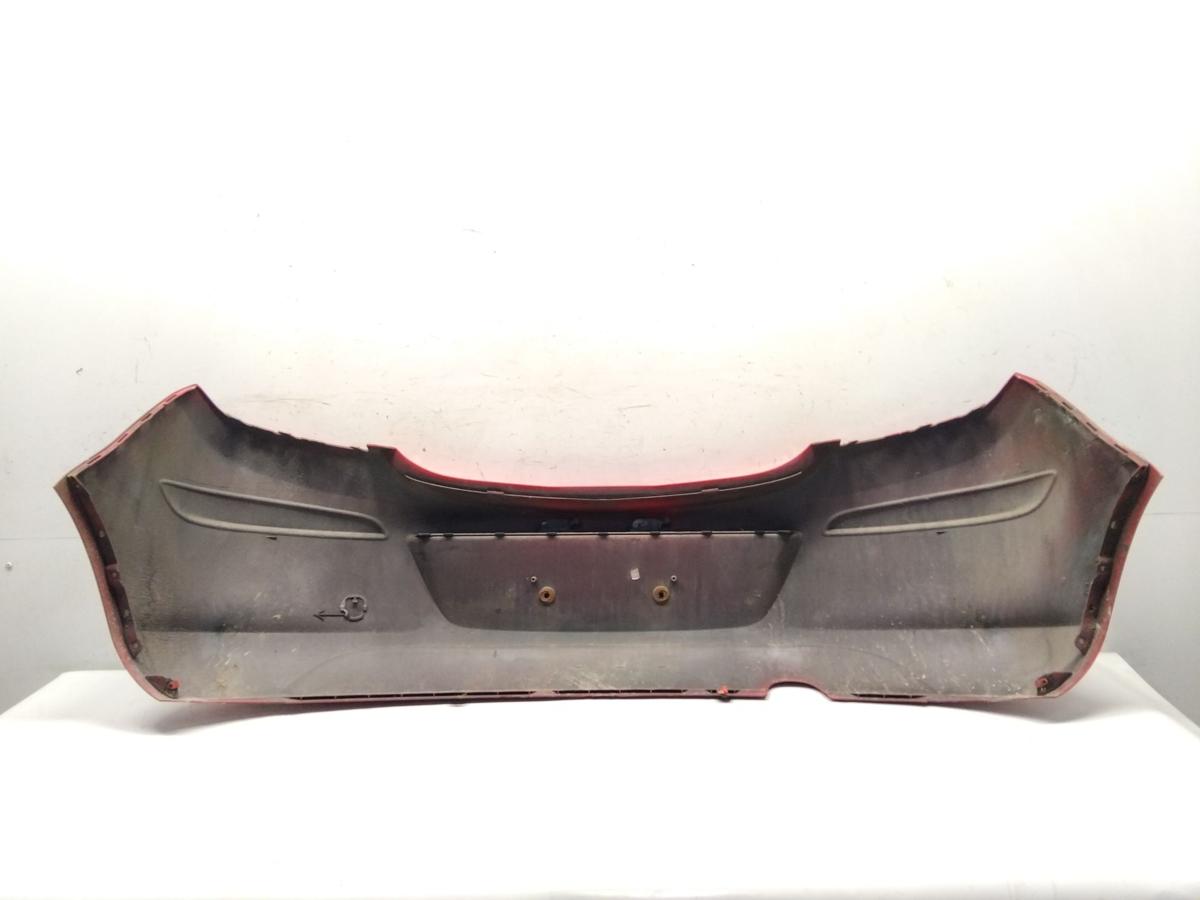 Opel Corsa D original Sto&szlig;f&auml;nger Sto&szlig;stange hinten 3-T&uuml;rer magmarot Z547 Bj.2008