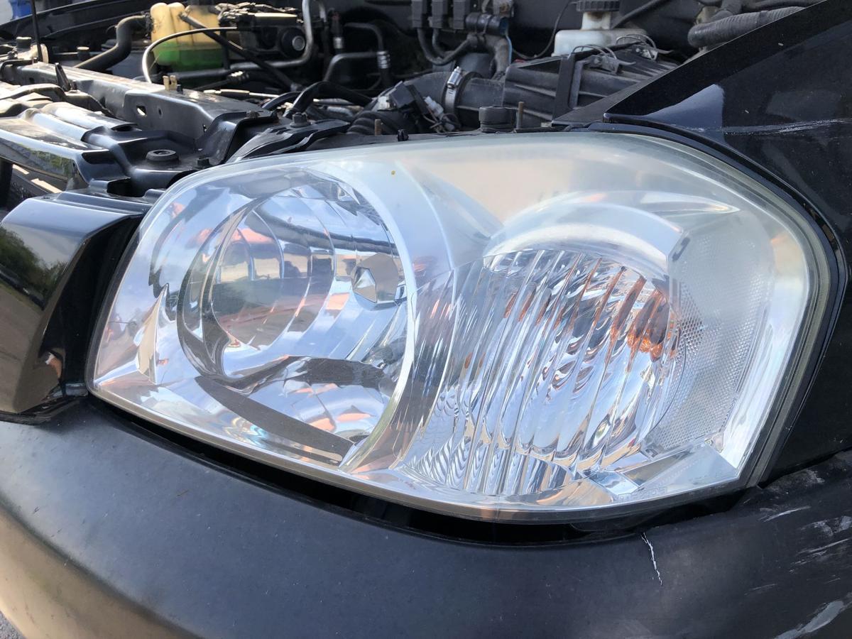 Mazda Tribute EP ab 2004 Scheinwerfer links Halogen Lampe EU Version Schaden!