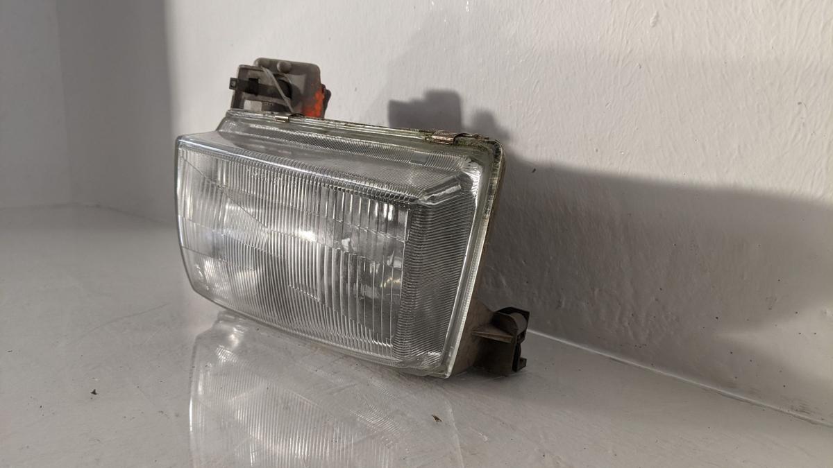 Mazda Demio Scheinwerfer Lampe links Halogen Stanley