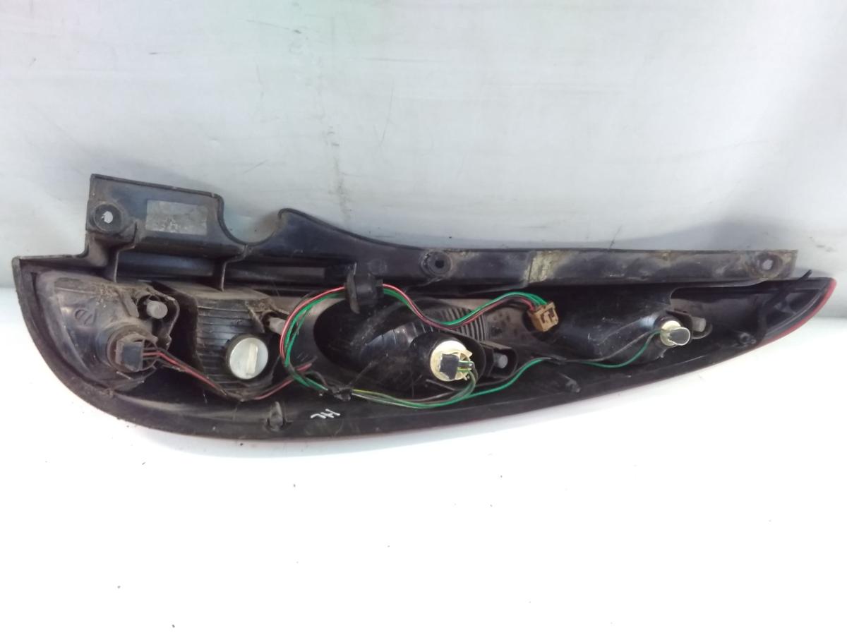 Nissan Almera Tino original Rückleuchte Schlussleuchte links BJ2001