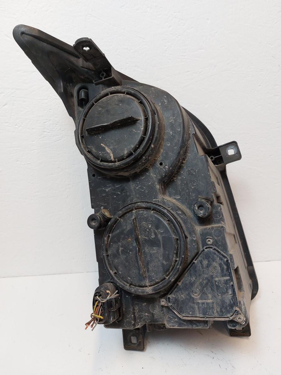 VW Crafter 35 2E Scheinwerfer links Halogen Hella Kratzer Frontscheinwerfer OEM